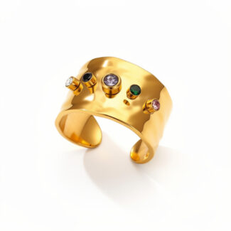 Bracelet manchette doré avec texture martelée et pierres précieuses colorées