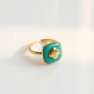 Bague ajustable dorée avec pierre turquoise et motif trèfle doré