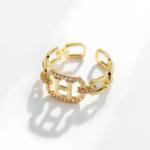 Bague dorée ajustable avec initiale H et pierres scintillantes