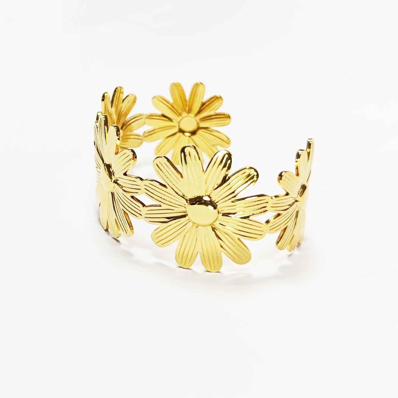 bracelet-manchette-dore-fleurs.webp