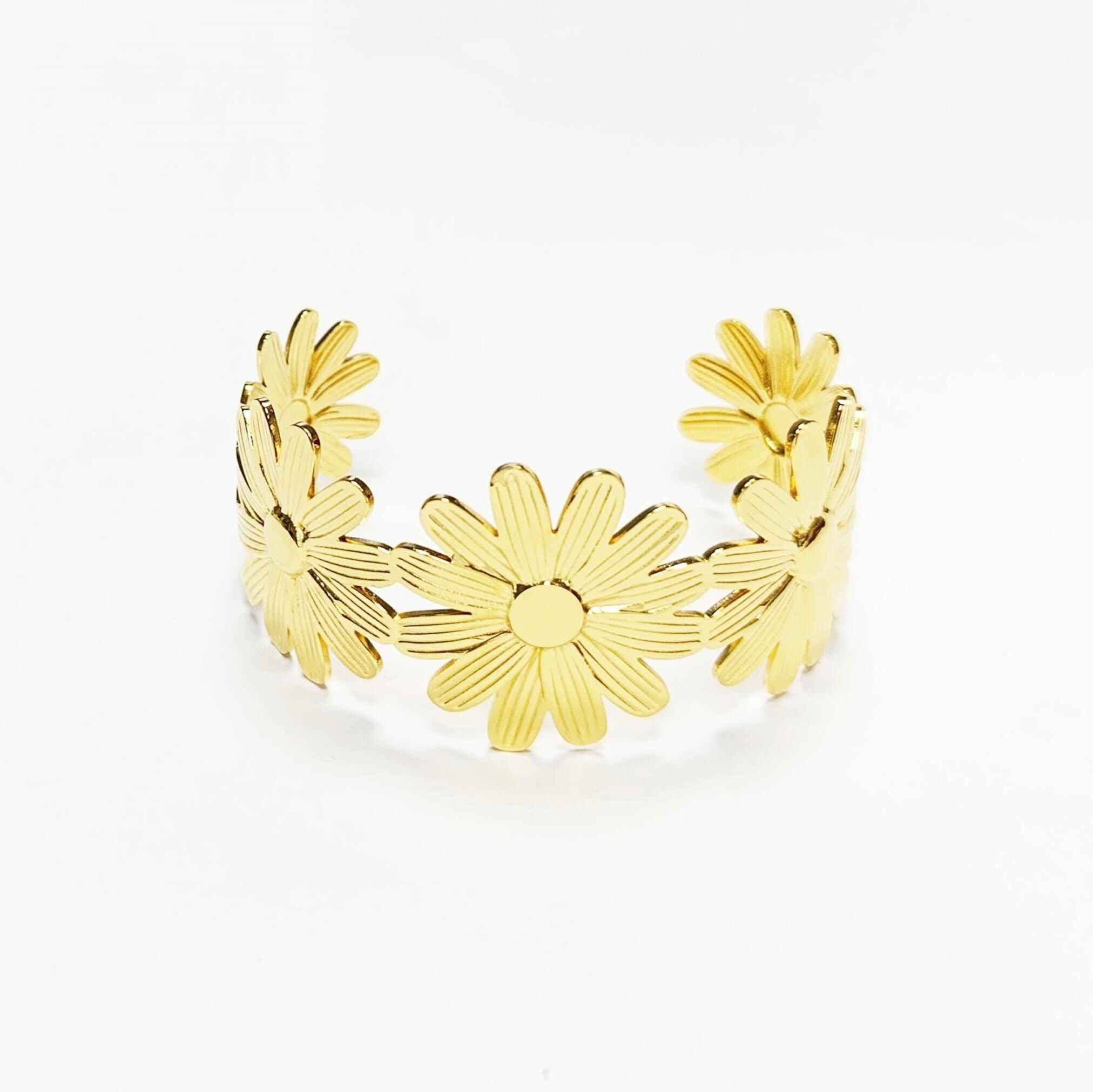bracelet-manchette-dore-fleurs.webp